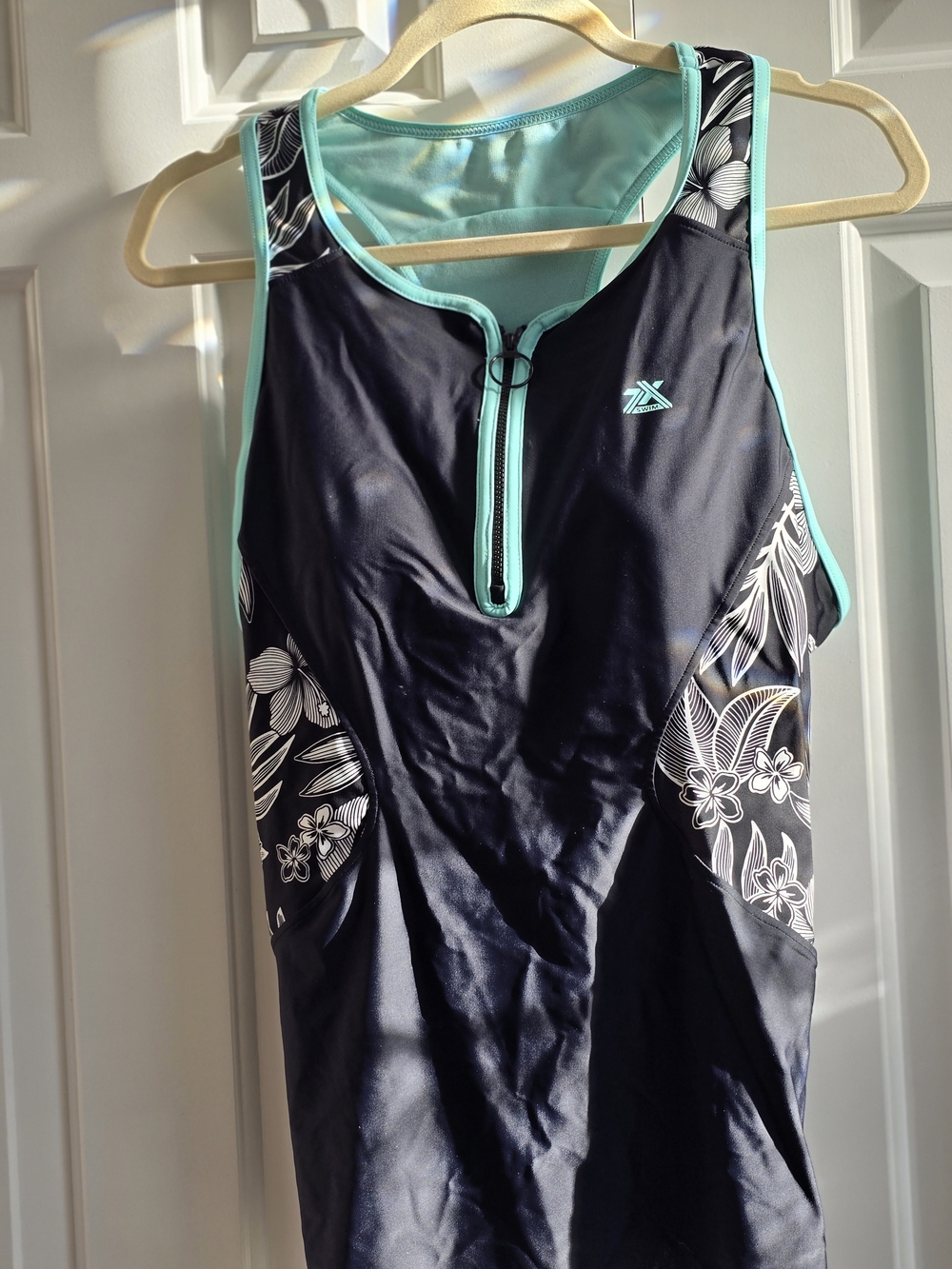 ZeroXposur Black Tankini with Aqua Trim and White Floral Accents